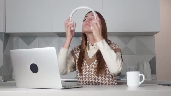 Woman Working From Home at Her Desk Opens Laptop Computer Front View Businesswoman Opening a