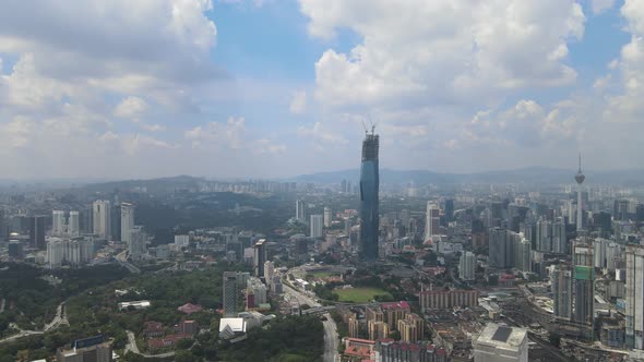 Kuala Lumpur, Malaysia - February 13, 2021: Drone view of Merdeka Tower in Kuala Lumpur 