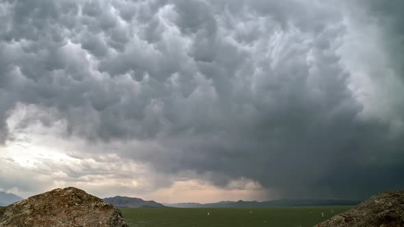 Dramatic clouds moving through the sky during windy rainstorm