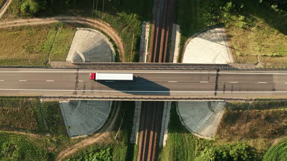 Car Road Junction With Bridge And Railway Under It Aerial Top View At Sunny Day