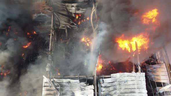 Aerial view fire and black smoke release