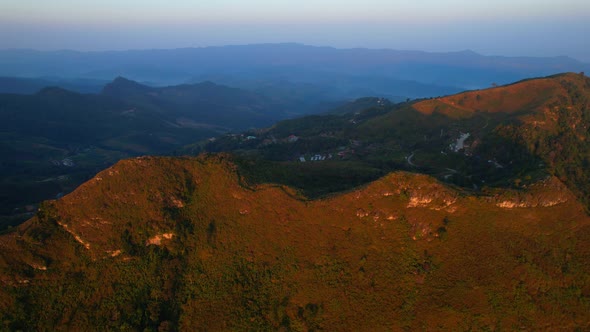 4K aerial view from a drone. High hill village in the morning