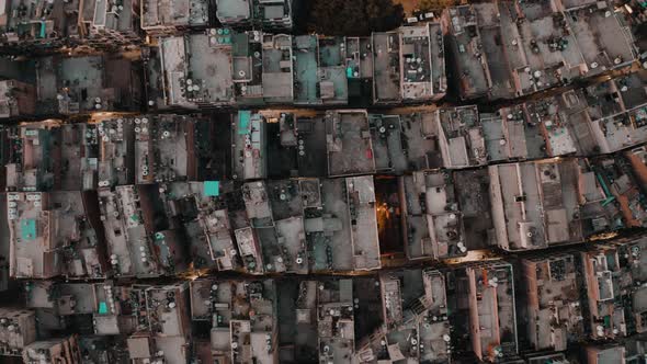 India, Delhi city center slums roofs aerial 4k drone footage, evening dusk