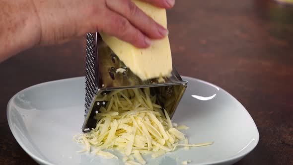 Chef Grating Cheese