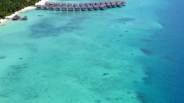 Drone aerial sky of tourist beach by clear water and sand background