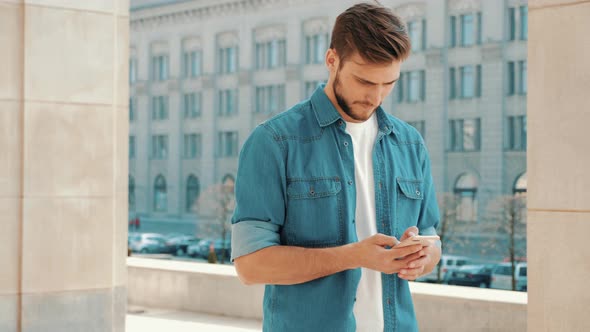 Portrait of handsome young bearded man. Male super connected to friends