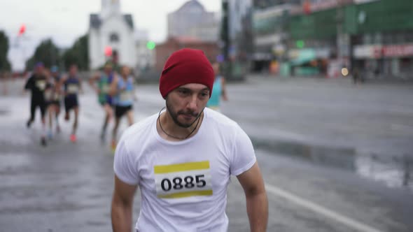 Major Running Competition with Crowds Groups of Athletic Runners and Sportsmen