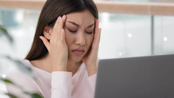 Close Up Headshot Asian Korean Lady Sick Ill Chinese Girl Stressful Business Woman Feeling Headache