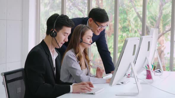 Business People Wearing Headset Working in Office