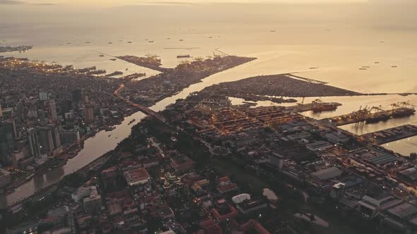 Sunset at Ocean Bay with City on River Banks Aerial