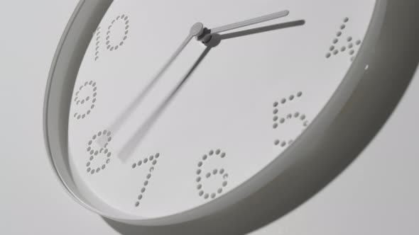 Dotted White Clock Face on Wall All Day