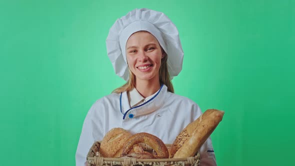 Female Baker with a Beautiful Smile Holding a