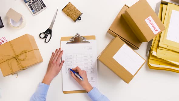 Woman with Parcels and Clipboard at Post Office 