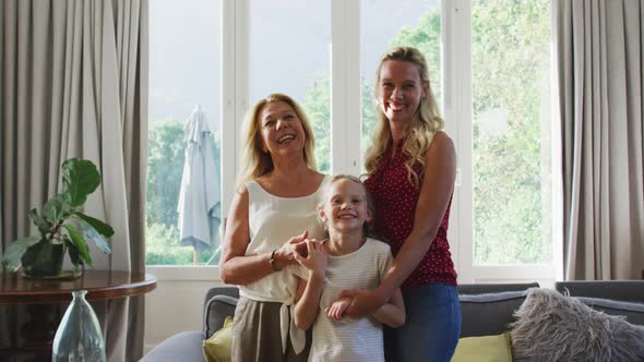 Caucasian woman spending time with her mother and her daughter