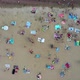 Top View of the Beach Featuring Colorful Umbrellas and People Relaxing - VideoHive Item for Sale