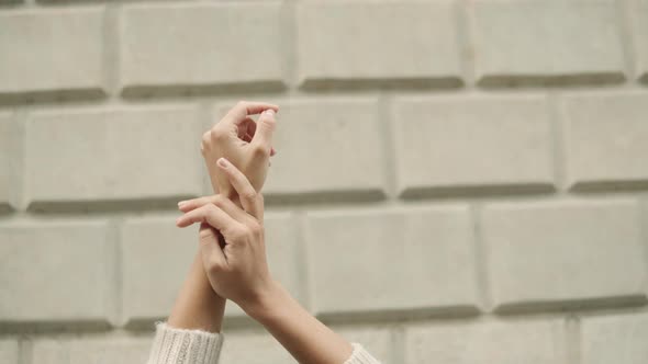 Women's Hands Touching Each Other alt
