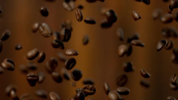 Roasted Coffee Beans Falling Down in Super Slow Motion