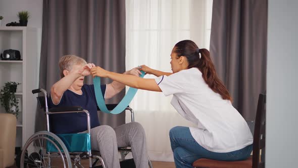 Invalid Senior Woman Exercising