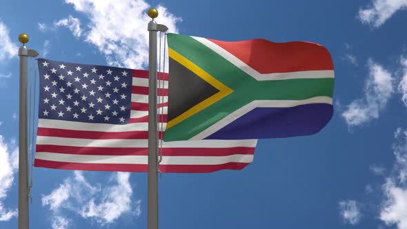 Usa Flag Vs South Africa Flag On Flagpole