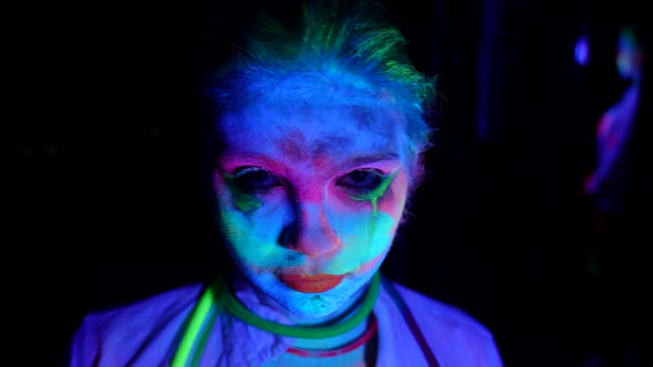 Closeup of a Female Face on a Dark Background