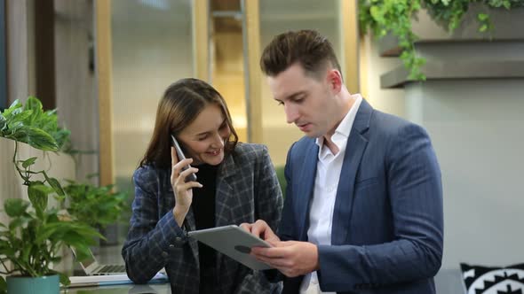 Business People Talking In a Cafe