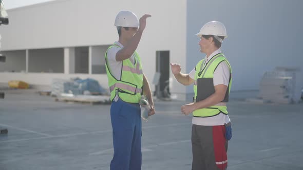 Confident Handsome Middle Eastern and Caucasian Men Giving Highfive Crossing Hands Posing in