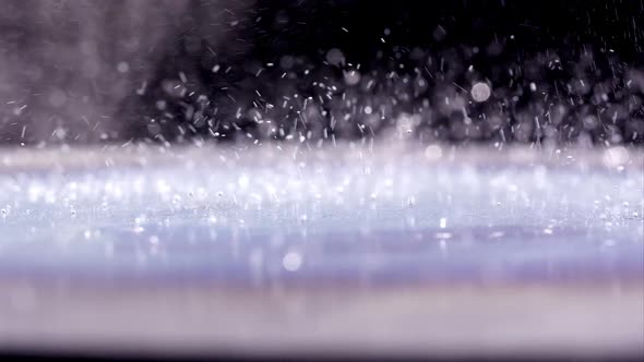 Macro of liquid bouncing on hot plate alt