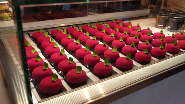 Handmade Red Candies Laid Out in a Row on a Plate