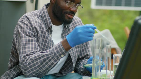 Scientist Using Petri Dish
