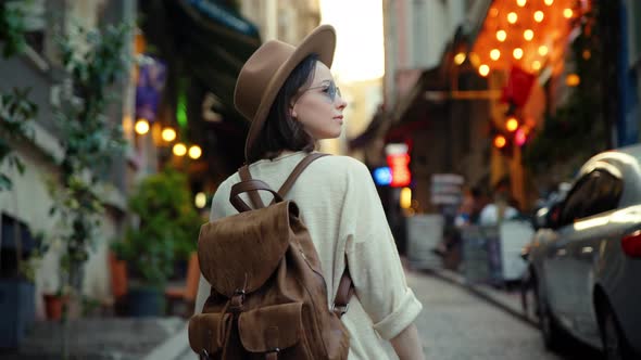 Young traveler with brown backpack on vacation in Istanbul, Turkey