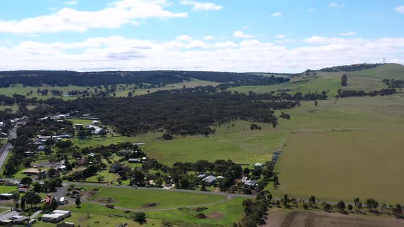 AERIAL Revealing Small Australian Country Township With Green Fields