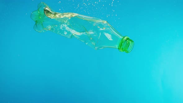 Throwing Plastic Bottle in the Ocean Floating Garbage Into the River or Lake Water Pollution