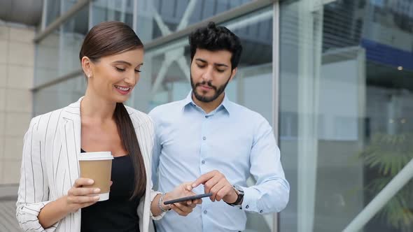 Business People Going To Work With Phone And Coffee On Street