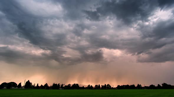 Time lapse of storm clouds rolling over the landscape