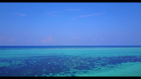 Aerial drone landscape of beautiful tourist beach journey by shallow sea and white sand background o