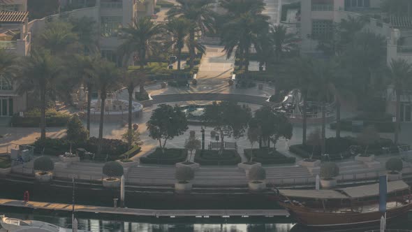 Dubai Marina Fountain Aeral Morning Timelapse Port with Luxury Yachts and Marina Promenade