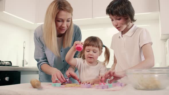 The Family Makes Cookies at Home