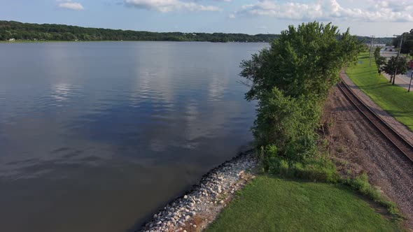 A drone shot containing both the railroad and the river near LeClaire Iowa