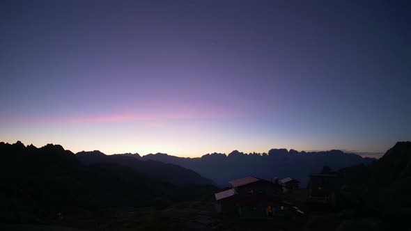 Stars Timelapse and Sunrise in Mountains