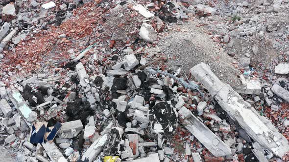 Rubble on the demolition site of a house. Pile of debris from the destruction of a building
