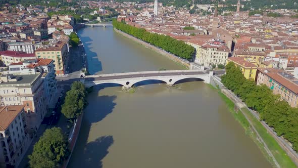 Verona, Italy: Aerial view of river and Bridges.Drone flies over the Adige river. Aerial video in 4K