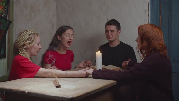 People on Spiritualistic Seance Frightened By Ghost