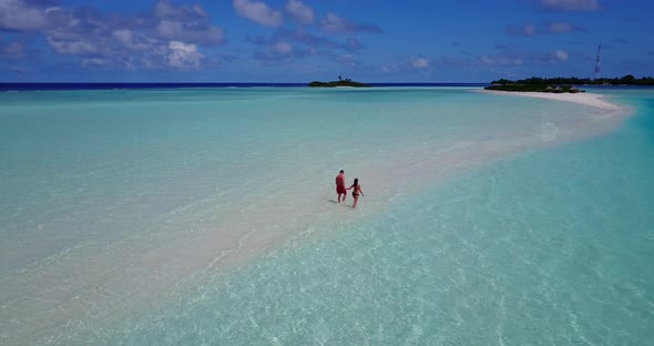 Beautiful people married on vacation live the dream on beach on paradise white sand background 4K