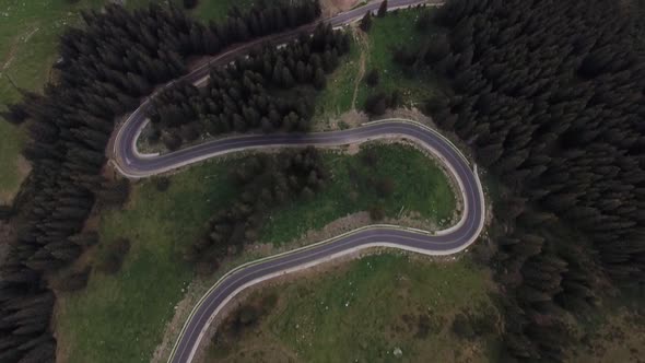 Mountain road aerial top-down scroll