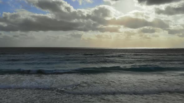 Aerial View of Turquoise Ocean Wave Reaching the Coastline Beautiful Beach From Top View