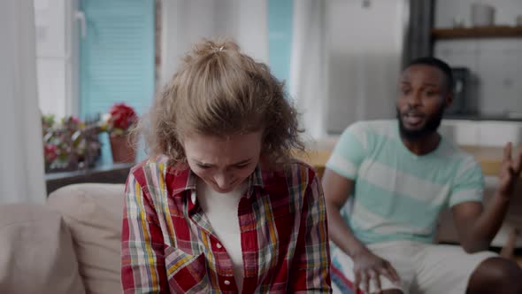 Angry AfricanAmerican Ethnicity Man Yell at Sad Girlfriend at Home