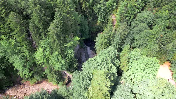 View of Waterfall in Mountains Forest