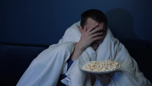 Scared Handsome Caucasian Man Watching Horror Movie Late Night Eating Popcorn Blanket Man Watching