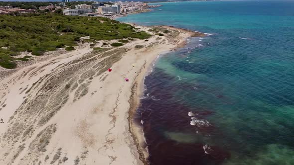 Aerial drone footage of the beach front on the Spanish island of Majorca Mallorca, Spain