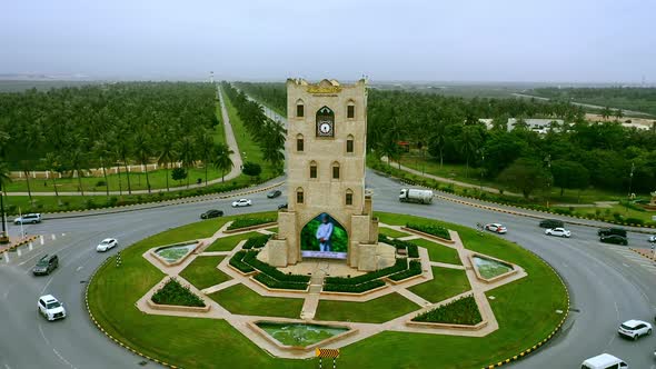 Aerial view of the Main Roundabout in Salalah,Translation on برج النهضة text "Renaissance Tower"